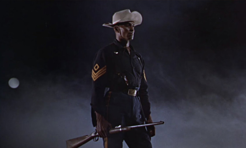 Woody Strode como Rutledge en El sargento negro